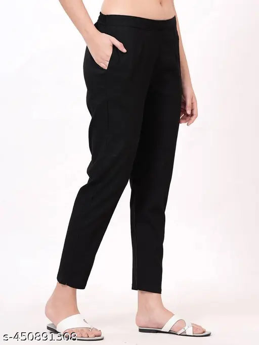 Black high-waisted trousers with black sandals, two-tone style