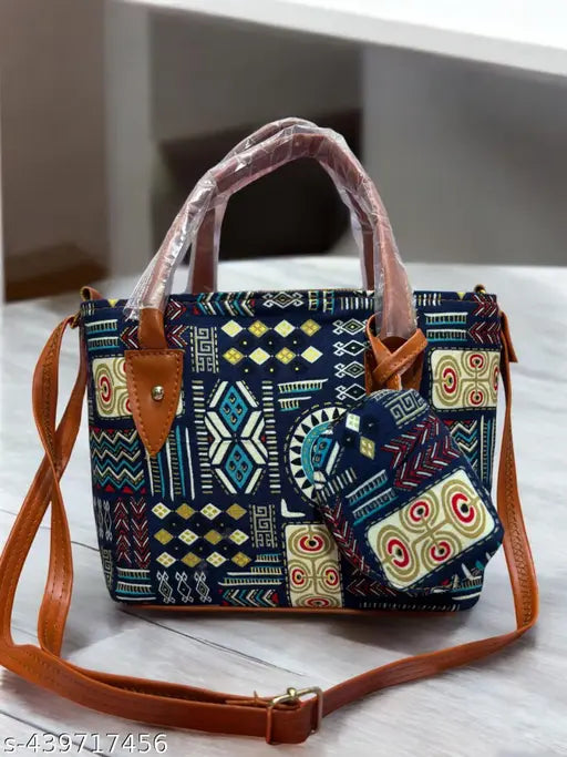Blue and orange print pattern, sling-style bag, shoulder strap, top closure with buckle, multiple pockets, suitable for women
