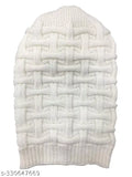 Beige knit winter hat with intricate braiding and ribbed cuffs