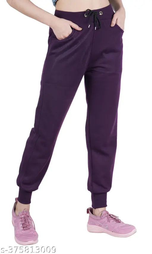 Purple track pants with a drawstring waistband