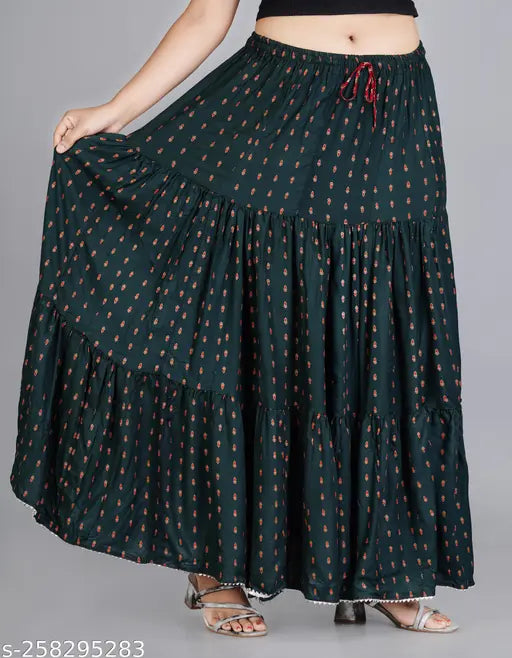 Green printed rayon long skirt for women, featuring a vibrant design on net fabric. Available in multiple sizes including free size. Made in India