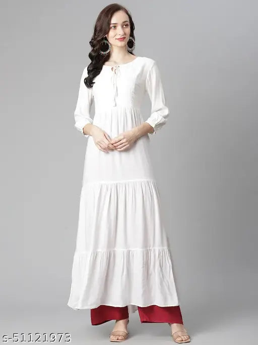 Off-white viscose rayon anarkali kurta, three-quarter sleeves, tiered design, round neck with slit and tie, flared hem, India origin