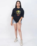 Black oversized printed t-shirt with a woman posing