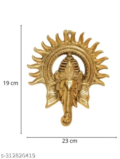 Golden Ganesh with Surya Kiran wall hanging, handcrafted metal statue. Used for Vastu decoration and prosperity. Dimensions: 23cm x 19cm x 23cm