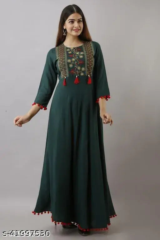 Green party dress with embroidery and side pockets