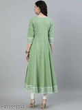Indian style long kameez with embroidered borders in light green