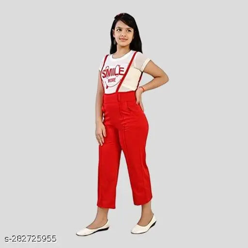 Red dungaree set with a white top and red pants