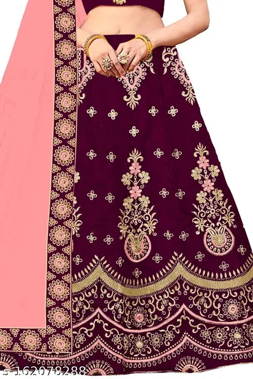 Satin lehenga choli in multi-colored embroidered design, suitable for parties & festivals. Indian-made traditional wear with net dupatta." (120 characters)