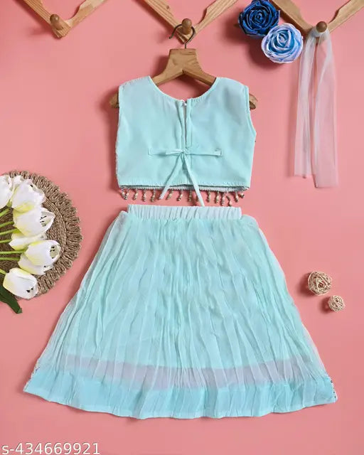 Sleeveless, embellished chiffon lehenga & choli set in net dupatta. Vibrant, Indian ethnic wear for kids, festive occasions. AWA KIDS FASHION on Gillkart." (125 characters)