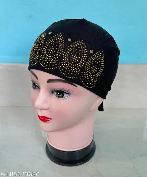 A cotton hijab cap with a black headband and floral embroidery