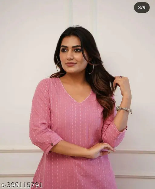 Pink cotton katha kurta set for summer, solid pattern, three-quarter sleeves. Model wears M size with bust 38in