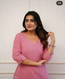 Pink cotton katha kurta set for summer, solid pattern, three-quarter sleeves. Model wears M size with bust 38in