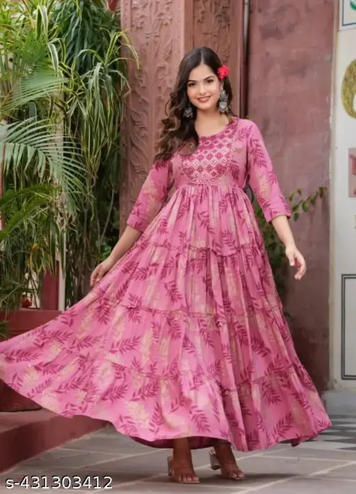 Pink viscose rayon kurti with three-quarter sleeves and printed pattern. Single size options available for S to XXXL