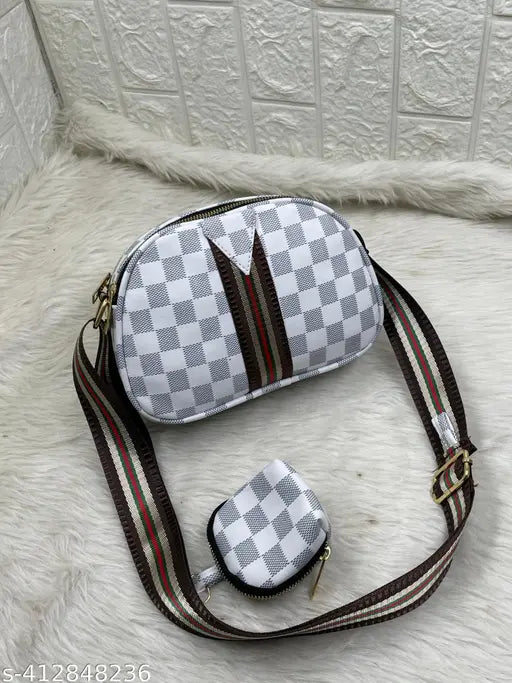 Grey checkered crossbody sling bag with coin pouch, strap closure