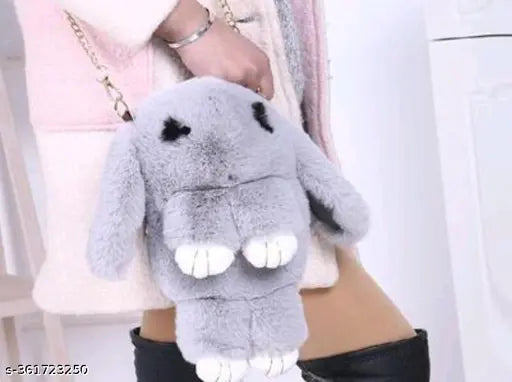 A soft, fluffy sling bag styled as a plush bunny with a chain and smooth zipper for girls