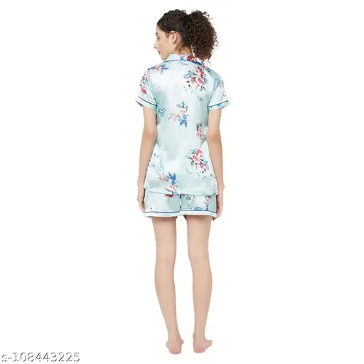 Turquoise floral print Japanese satin women's nightsuit with lapel collar and button closure, available in sizes XS to 5XL. Model wears size S. Made in India