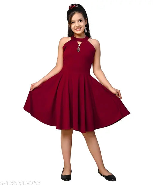 A girl in a long, red one-piece dress
