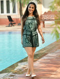 Green rayon printed A-line sleeveless casual mini jumpsuit for girls on model, perfect for any occasion