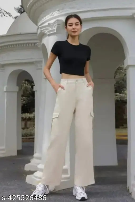 Brown high-waisted trousers with a dark top