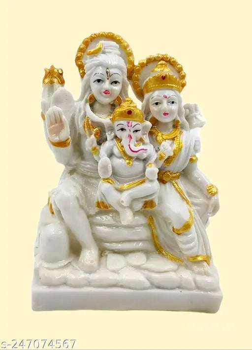White idols of Lord Shiv, Goddess Parvati, and Lord Ganesha in a family setting, temple-style decoration