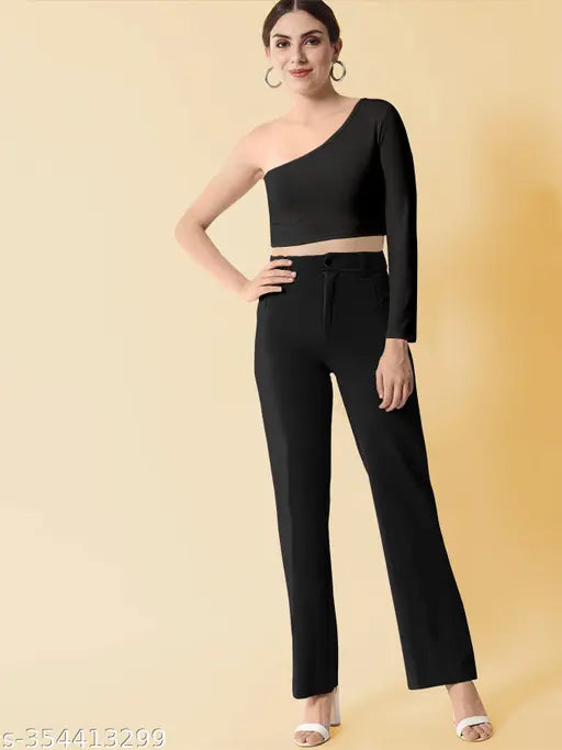 Black high-waisted trousers with a cropped top and wide-leg fit, possibly satin material