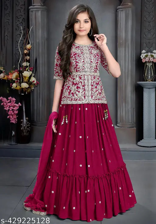 Nylon embroidered kids lehenga choli, vibrant colors, perfect for weddings. Traditional Indian designer outfit with net dupatta and three-quarter sleeves