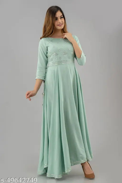 Olive green rayon fit and flare dress with embellished pattern, three-quarter sleeves