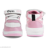 Pink kids sports shoes with white trim and black straps