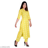 New yellow pattern cotton kurta with embroidered net pants, three-quarter sleeves, Indian handcrafted clothing