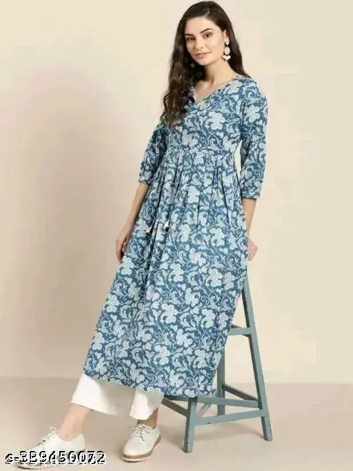 Pretty sensational women's rayon top with three-quarter sleeves, colorful print design