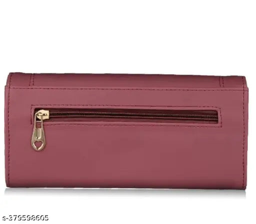 Maroon leather wallet with a zipper and card slots, from the side