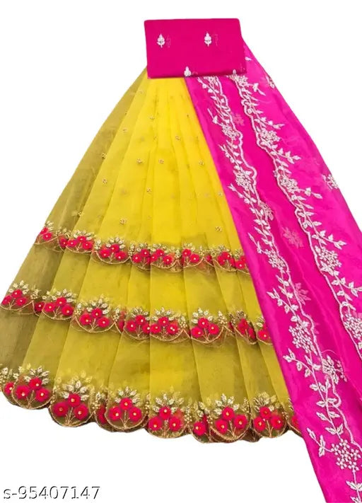 Embroidered dupion silk and net lehenga with heavy thread work, semi-stitched (waist size: 44in, length: 43in), featuring cut work border and a matching heavy net dupatta with beautiful thread work broder and length 2.10-2.20m, handcrafted in India