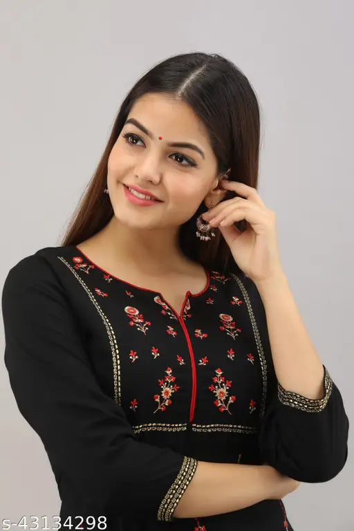 Trendy voguish rayon kurta sets, three-quarter sleeves with palazzos, embroidered net ethnic design from India