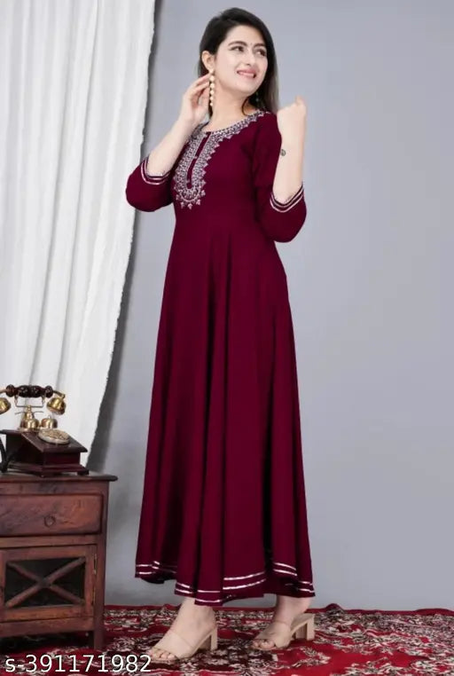 Rayon three-quarter sleeve embroidered maroon gown for women, India-origin fashion on model