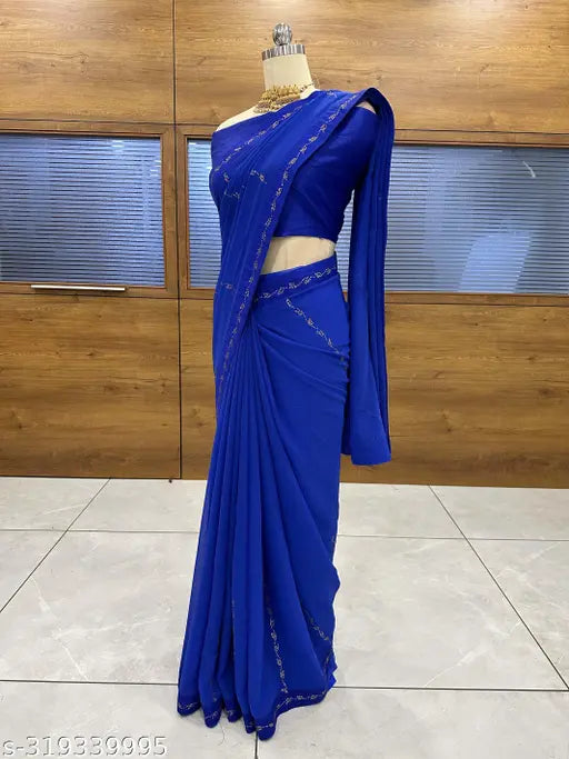 A beautiful blue georgette saree with embroidered borders