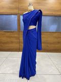 A beautiful blue georgette saree with embroidered borders