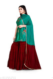 Teal green embroidered kurta set with matching dupatta and skirt
