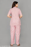 Women's printed pink rayon night suit set, featuring short-sleeved top and pyjama bottoms in a vibrant design, available in L, XXL, and XXXL sizes