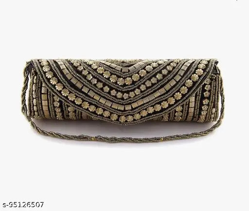 Black handcrafted women's clutch purse with embellishments, possibly sequins or beads