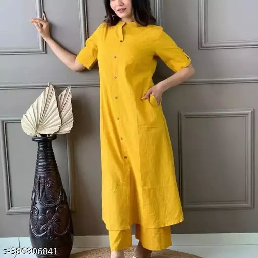Attractive cotton blend kurta pant set with printed net pattern, three-quarter sleeves. Beautiful long khatta cotton kurta pant set on display stand, single size options S-XXL. Indian handcrafted traditional wear