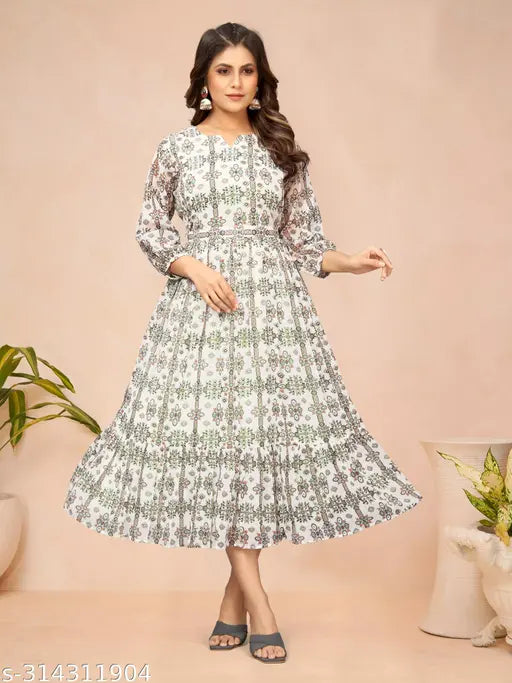Fashionable black and white floral patterned kameez, three-quarter sleeves, knee-length skirt
