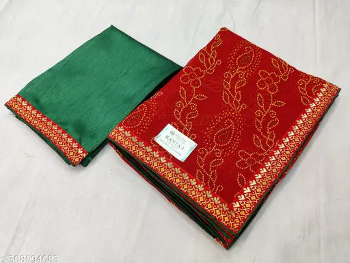 Red and green patterned fabric, traditional bandhani sari with intricate design
