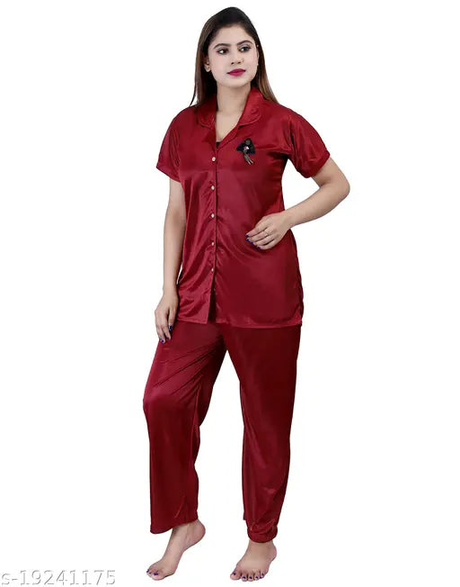 Maroon satin women's nightwear with a notched collar, shirt and pants