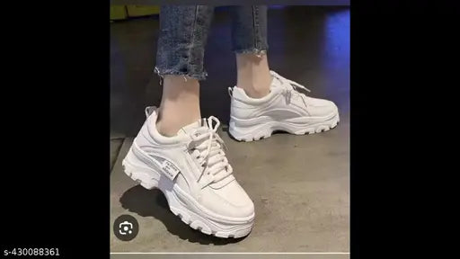 White synthetic Star Frenzy sneaker with rubber sole, lace-up net detail, and varying sizes from US 3 to 8 (10in - 12.5in foot length)