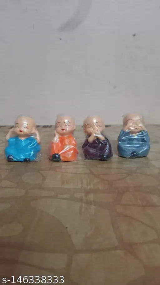 Poly resin, cute baby monk set of 4 Buddha statues from India