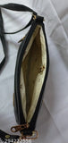 Black sling bag with adjustable strap and black detail