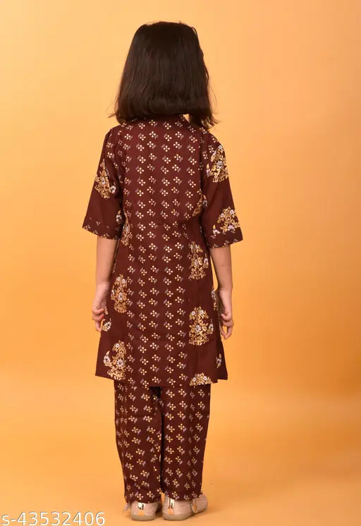 Maroon floral printed girls kurta and trousers set, rayon fabric, knee-length top with three-quarter sleeves, India origin