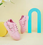 Pink sneakers with floral detailing, lace closure