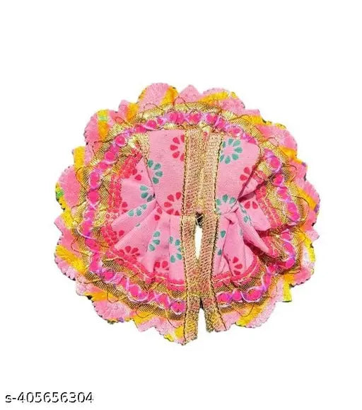 Laddu, Indian sweet with traditional poshak design