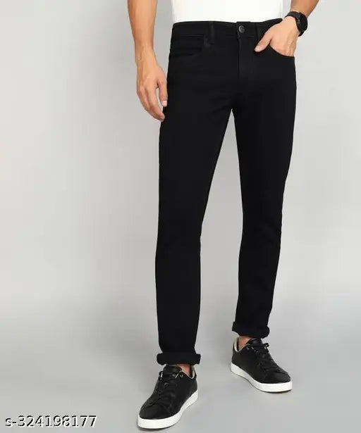 Black denim regular fit jeans, solid pattern, five pockets, mid rise, button waist closure, clean wash, full length, correct size, good fitting, skinny fit shape, origin in India. Men's black jeans from Naina Enterprises